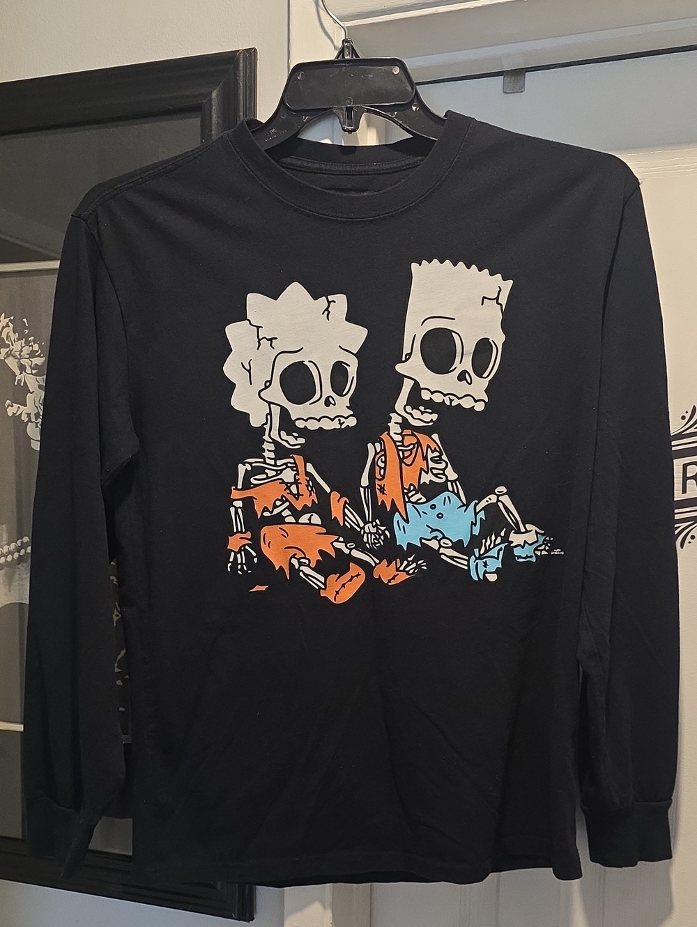 Black Long-Sleeve Graphic Tee with Skeleton Cartoon Print